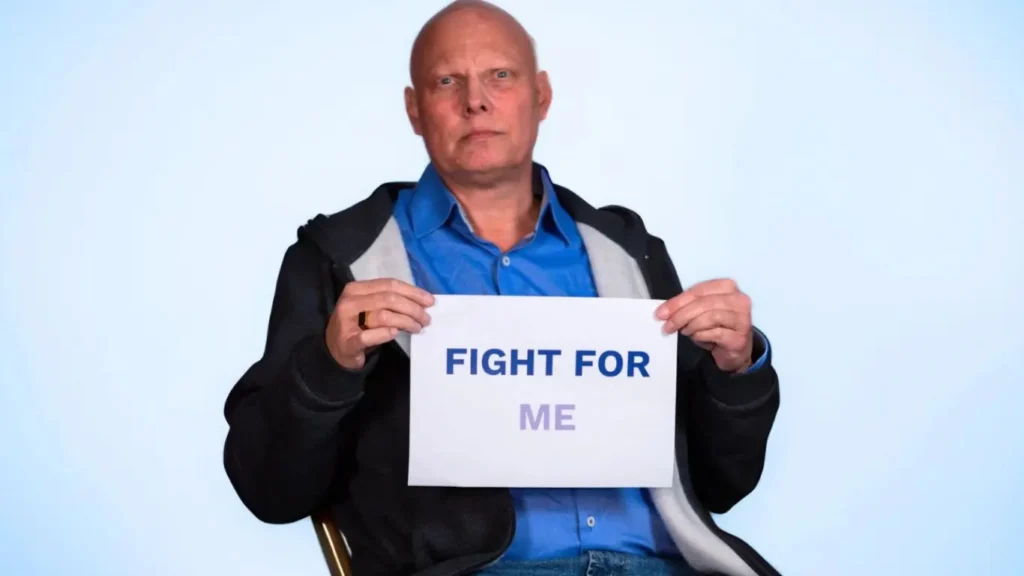 Person med skylt "Fight for ME"